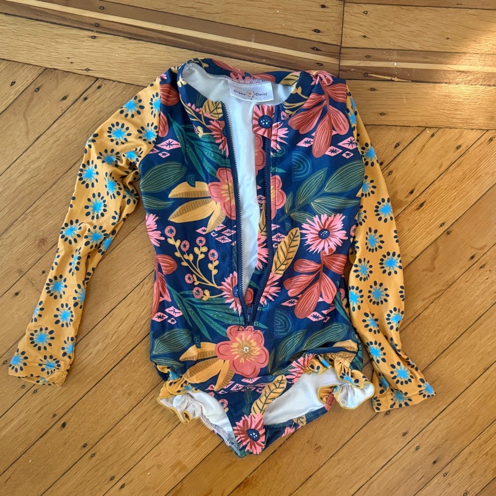 Oopsie daisy swimsuit rashguard